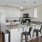 a kitchen with white cabinets