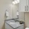 a bathroom with a marble countertop