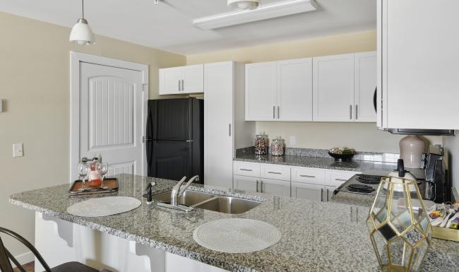 Beautiful kitchens with designer finishes a kitchen with white cabinets